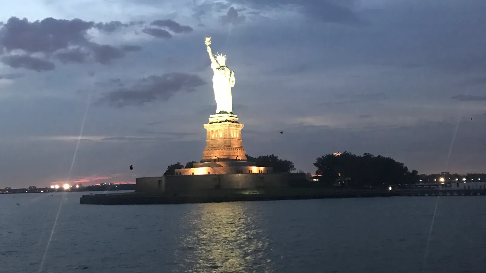 Atlantis of New York Cruises vessel on the water at evening