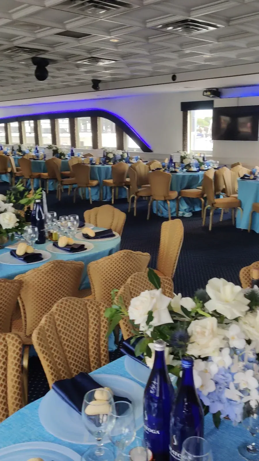 Interior and deck area aboard Atlantis of New York Cruises