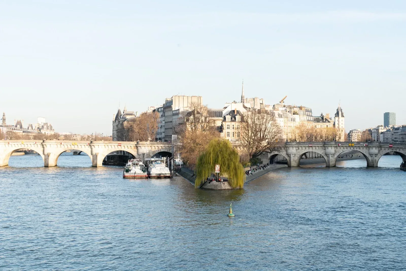 Vedettes du Pont Neuf boat on the Seine at evening